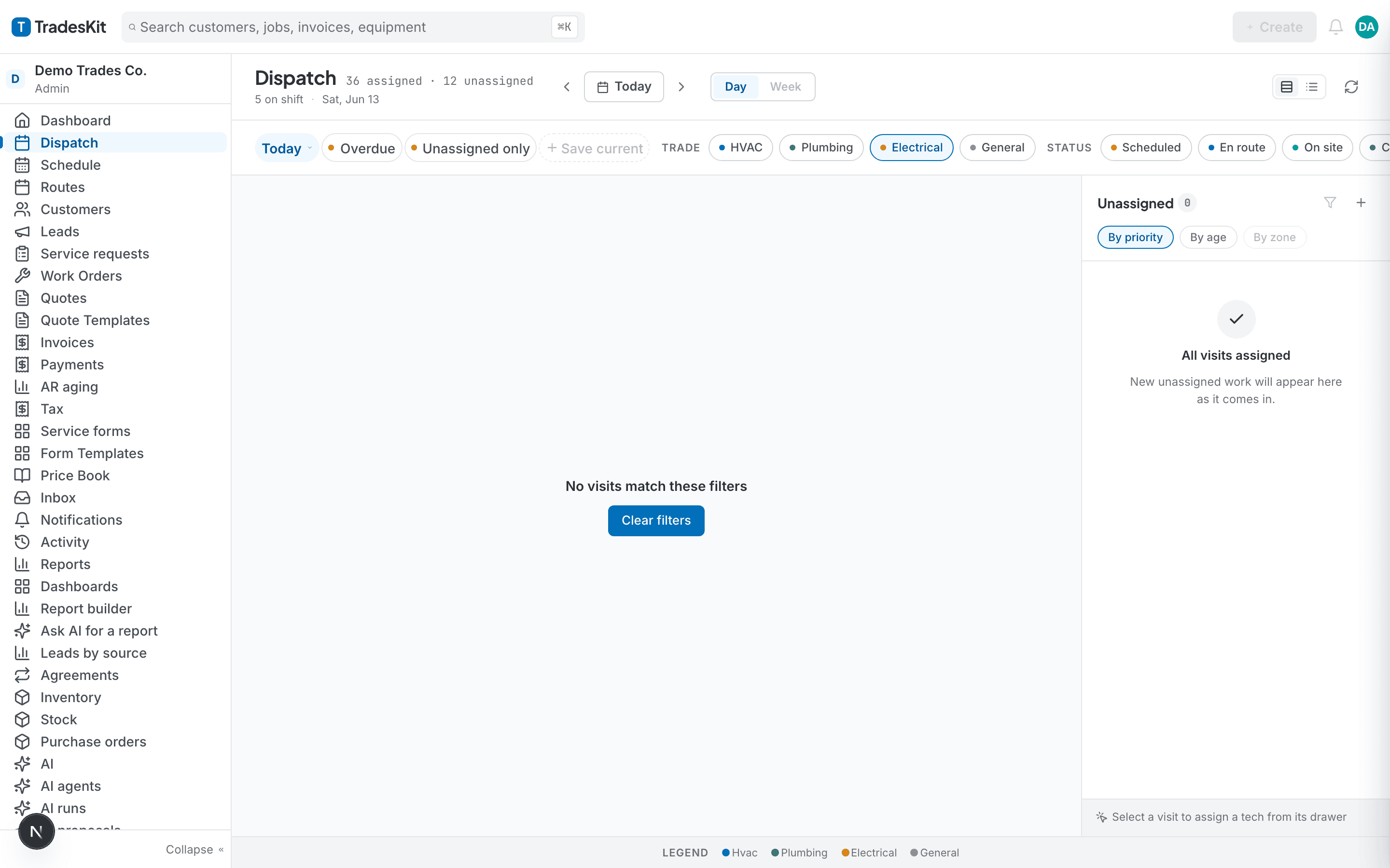 TradesKit dispatch board filtered to electrical jobs with AI-suggested reassignments